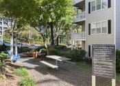 Thumbnail 22 of 31 - Picnic table at Park Summit Apartments in Decatur, GA 30033