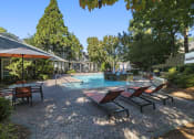 Thumbnail 8 of 31 - Pool lounge chairs at Park Summit Apartments in Decatur, GA 30033