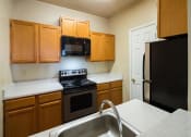 Thumbnail 4 of 31 - Stainless Steel Sink With Faucet at Park Summit Apartments, Decatur