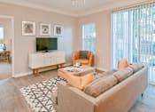 Thumbnail 5 of 31 - Spacious Living Room with Patio at Polos at Hudson Corners Apartments, South Carolina 29650