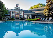 Thumbnail 13 of 31 - Resort-Style Swimming Pool with Leasing Office at Polos at Hudson Corners Apartments, South Carolina 29650