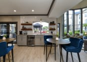 Thumbnail 26 of 33 - Clubhouse gathering area and kitchenette at The Retreat at Steeplechase, Houston, TX