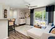 Thumbnail 6 of 29 - Living Room with Large Patio at Rise at Signal Mountain, Chattanooga, TN