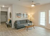 Thumbnail 4 of 26 - Spacious Living Room at Sandstone Creek Apartments in Overland Park, KS