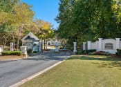 Thumbnail 33 of 33 - Front entrance gate and sign located at St. Andrews Apartments in Johns Creek, GA 30022
