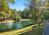 Thumbnail 26 of 33 - Onsite lake with water fountain and walking trail  located at St. Andrews Apartments in Johns Creek, GA 30022