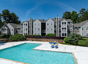Thumbnail 25 of 25 - A swimming pool in front of a building at Station Heights, Alpharetta Georgia 
