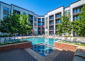 Thumbnail 1 of 28 - Pool With Deck at Station at Old Town, Lewisville, TX