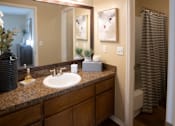 Thumbnail 8 of 30 - Bathroom with a Mirror at Stewarts Ferry Apartments, Nashville, Tennessee