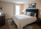 Thumbnail 7 of 30 - Bedroom with a Large Bed at Stewarts Ferry Apartments, Tennessee
