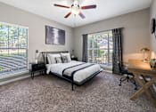 Thumbnail 15 of 34 - Primary Bedroom at Sugarloaf Crossing Apartments, Lawrenceville, GA