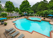 Thumbnail 2 of 34 - Glimmering Pool at Sugarloaf Crossing Apartments, Lawrenceville, 30046