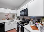 Thumbnail 6 of 48 - Fully Equipped Kitchen  at The Ambrose, Houston, TX, 77040