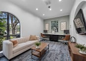 Thumbnail 27 of 48 - Clubroom With TV at The Ambrose, Houston, TX, 77040