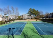 Thumbnail 26 of 39 - Smooth And Well Kept Tennis Court at The Berkeley Apartments, Georgia, 30096
