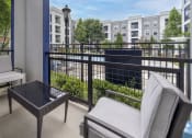 Thumbnail 15 of 33 - a patio with furniture overlooking pool at The Haven, Atlanta Georgia