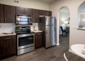 Thumbnail 1 of 33 - Modern Kitchen with Stainless-Steel Appliances  located at Retreat at Steeplechase in Houston, TX 77065