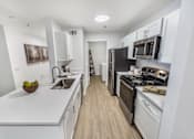 Thumbnail 6 of 27 - Modern Kitchen at The Dawson Cartersville Apartments, Cartersville, Georgia