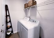 Thumbnail 11 of 27 - Small Laundry Room at The Dawson Cartersville Apartments, Georgia