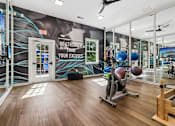 Thumbnail 29 of 33 - A gym with a motivational poster on the wall.