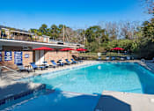 Thumbnail 9 of 19 - Swimming Pool with Sun Deck located at Venue at Carrolton in Carrolton, GA 30117