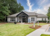 Thumbnail 15 of 27 - the front of a white house with a lawn and sidewalk at Twenty35 at Timothy Woods, Athens, GA