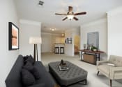 Thumbnail 5 of 23 - Living Room With Kitchen View at Villas at Carrington Square in Overland Park, KS
