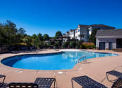 Thumbnail 17 of 20 - Swimming Pool And Sundeck at Walden Oaks, Anderson, South Carolina