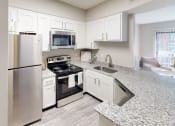 Thumbnail 1 of 25 - Model kitchen Waterford Place Louisville KY 40207