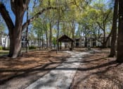 Thumbnail 11 of 15 - Courtyard with picnic area at Westbury Mews Apartments in Summerville SC 29485