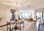 Thumbnail 4 of 18 - Wood style flooring and open floor plans at Harrison Apartments, Sarasota