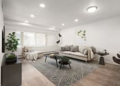 Thumbnail 8 of 34 - Living room with light fixture, hardwood flooring, white walls, and windows with blinds