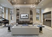 Thumbnail 22 of 25 - a living room filled with furniture and a flat screen tv