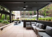 Thumbnail 30 of 34 - Courtyard with covered seating area