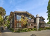 Thumbnail 4 of 12 - Property Building View with Manicured Landscaping at 3543 Brook Street Apartments in Lafayette, CA