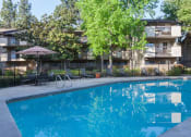 Thumbnail 19 of 27 - Pristine swimming pool at Carrington Apartments, California