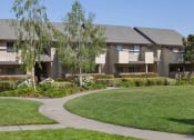 Thumbnail 3 of 27 - Courtyard With Green Space at Carrington Apartments, Fremont, 94538