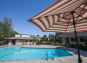 Thumbnail 21 of 27 - Pool Side Relaxing Area at Carrington Apartments, Fremont, CA, 94538