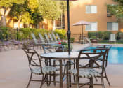Thumbnail 12 of 43 - Dining Area Alongside Pool at The Monterey, San Jose, California