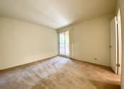 Thumbnail 13 of 46 - Carpeted Living Area at Diablo Pointe, California, 94596