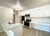 Thumbnail 17 of 24 - Modern Kitchen With White Cabinet at The Morgan, Lafayette, 94549