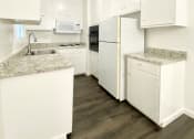 Thumbnail 14 of 30 - Kitchen With White Cabinetry And Appliances at 2120 Valerga Drive Belmont, California, 94002