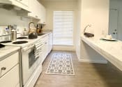 Thumbnail 20 of 33 - Kitchen With White Cabinetry And Appliances at Valley West, San Jose, CA, 95122