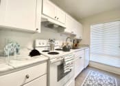 Thumbnail 24 of 33 - Electric Range In Kitchen at Valley West, California