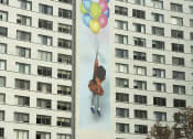 Thumbnail 37 of 38 - a mural of a girl holding balloons is shown on the side of an apartment building