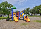 Thumbnail 9 of 39 - a playground with a yellow and blue slide