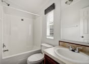 Thumbnail 20 of 39 - a bathroom with a toilet sink and bathtub
