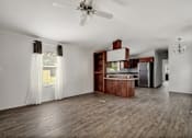 Thumbnail 7 of 30 - Warm Living And Dining Room at Country Oaks, Texas, 78253