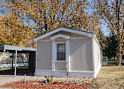 Thumbnail 4 of 46 - a tiny house on the side of a yard with trees 82007
