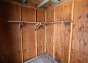 Thumbnail 32 of 46 - the inside of a wood walled room with wooden walls and wooden beams at Circle Park, Cheyenne
